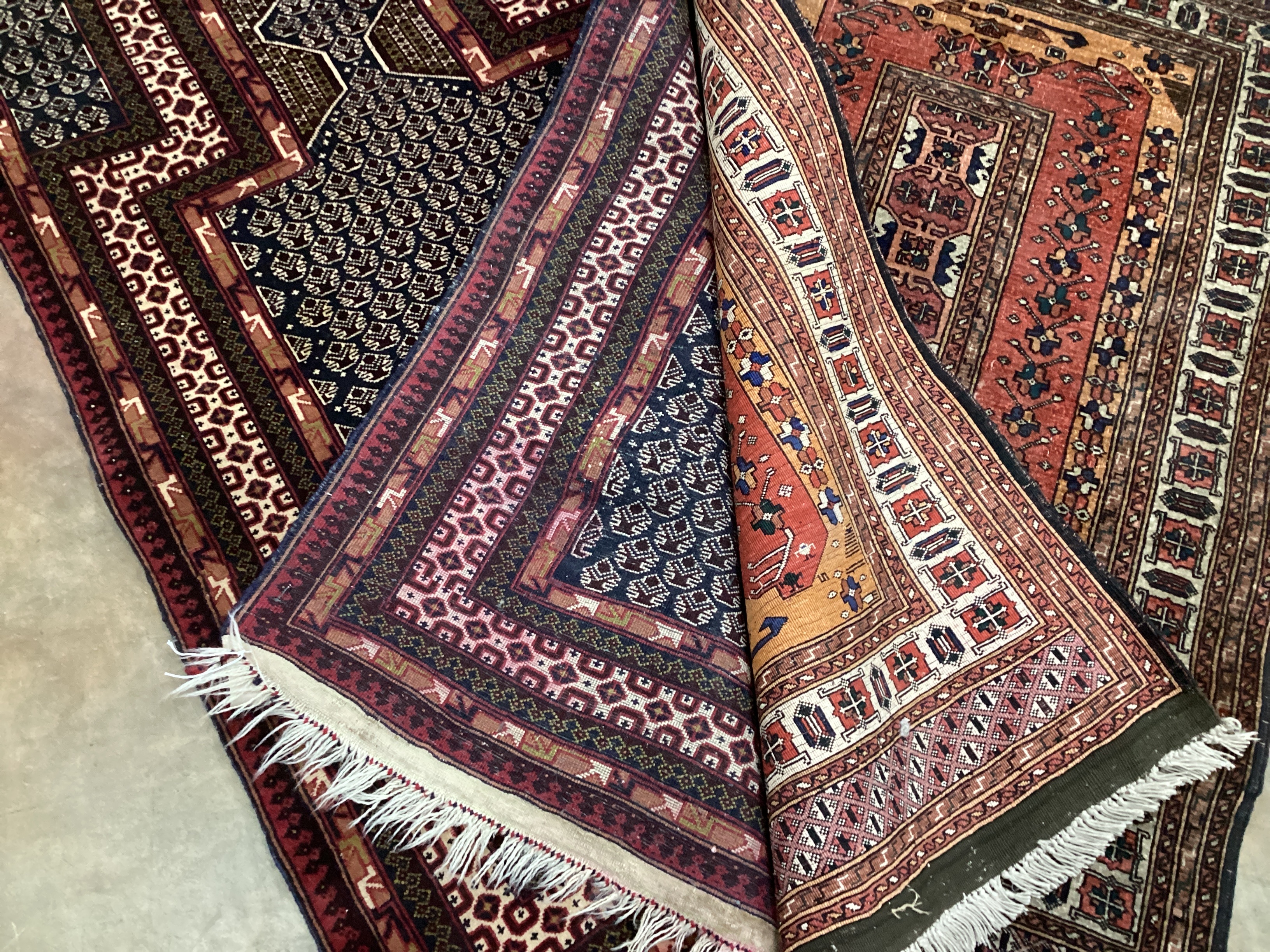A North West Persian prayer rug, 140 x 85cm and a small red ground rug, 132 x 85cm
